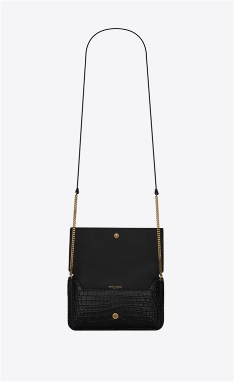 ysl cassandra croc embossed|CASSANDRE phone holder in SHINY crocodile.